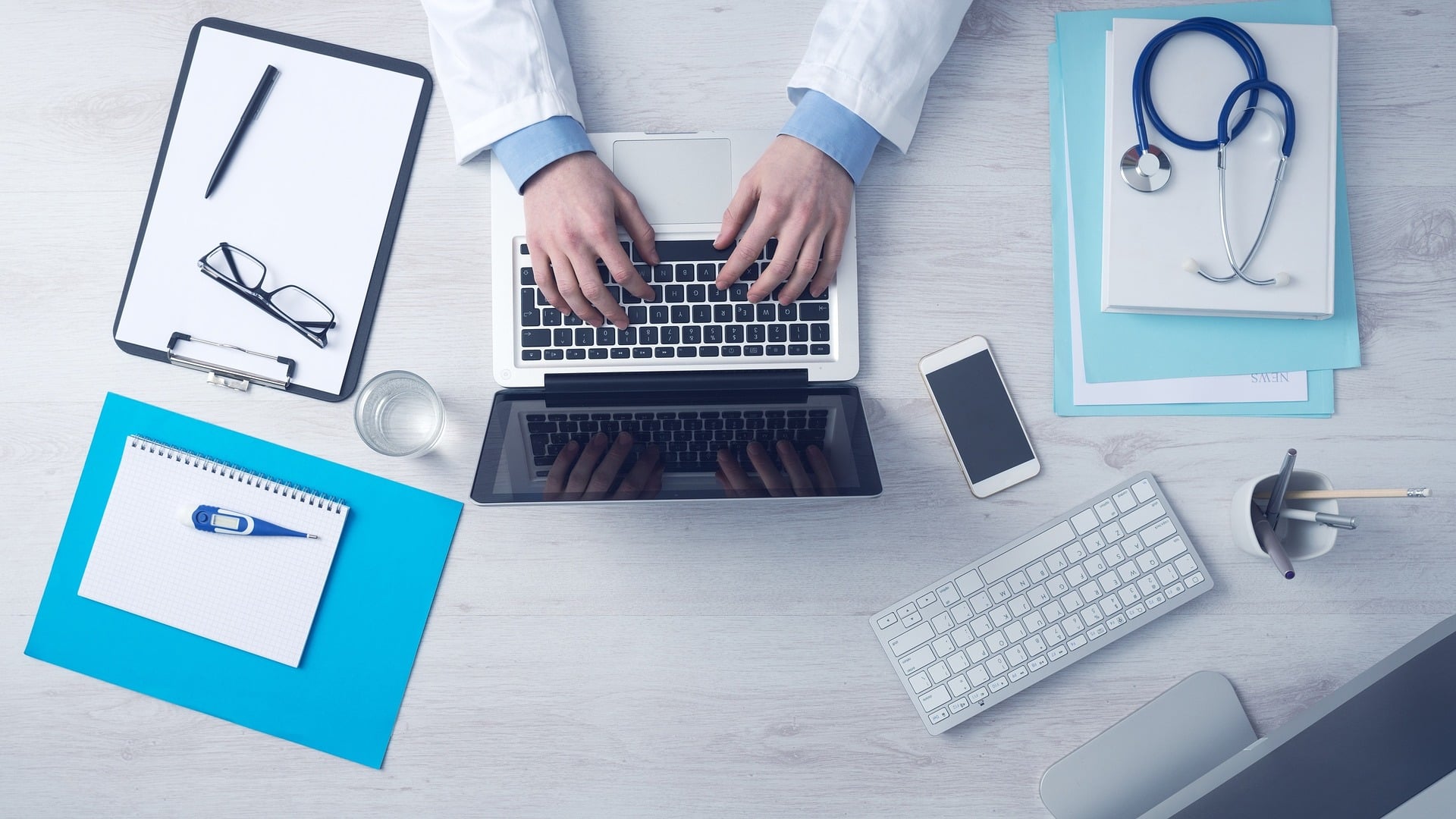 A medical professional communicating with technology