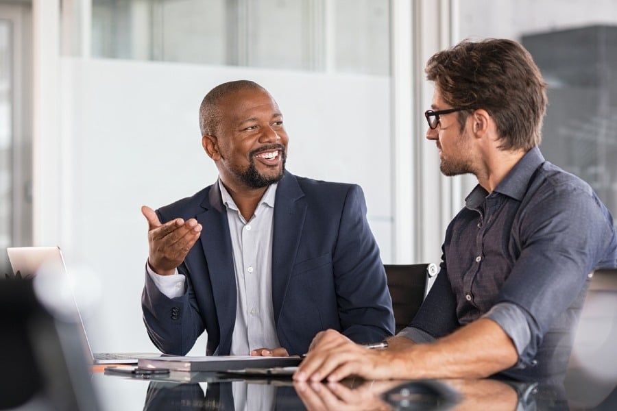 Two employees talking