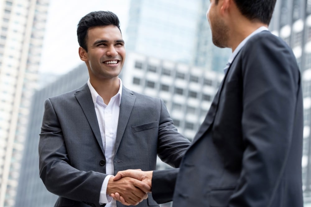 Boss talking to customer