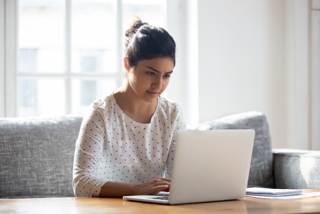 Woman on a laptop.