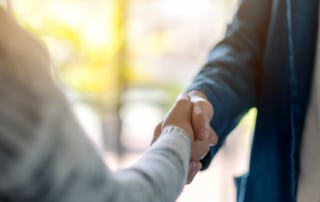 two people shaking hands