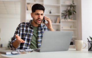 Angry customer on the phone with a customer service representative