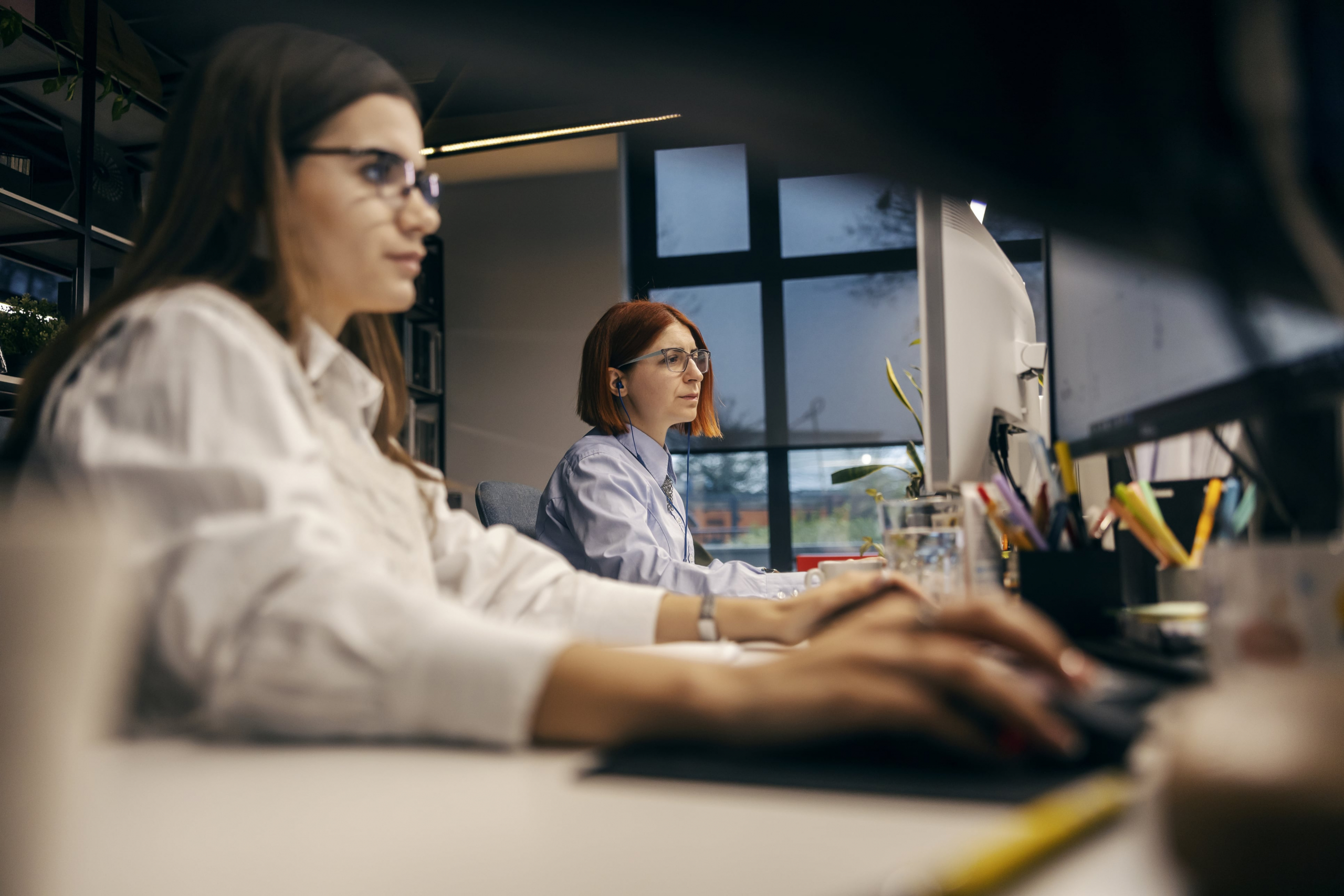 female office worker working on her computer
